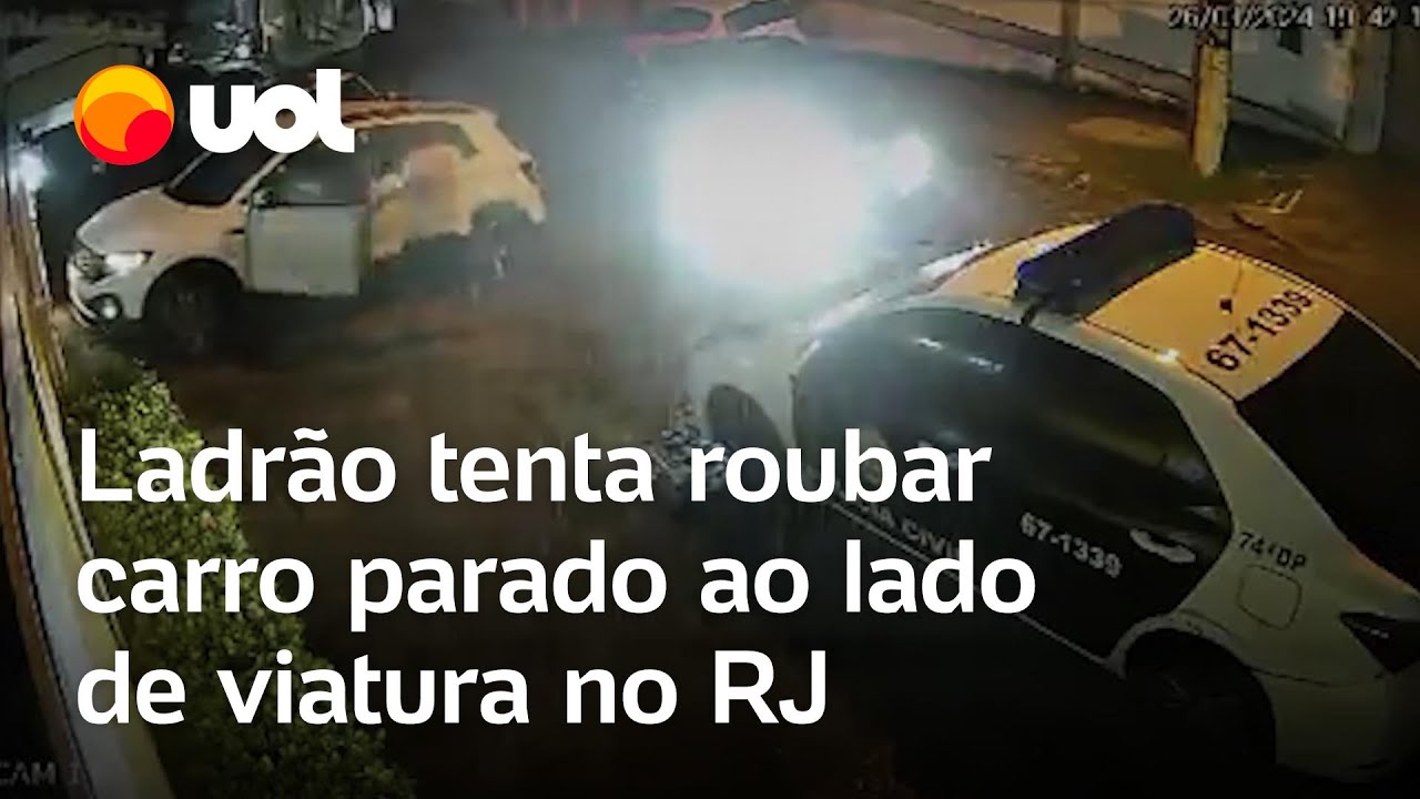 Vídeo flagra ladrão tentando roubar carro estacionado ao lado de viatura da polícia no RJ